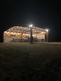 a view of a field with a sign board