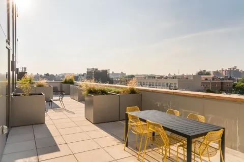 a view of a terrace with furniture