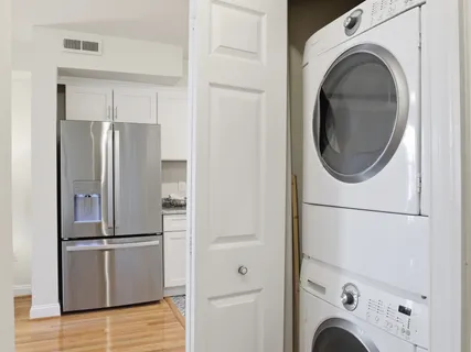 a view of kitchen with washer and dryer