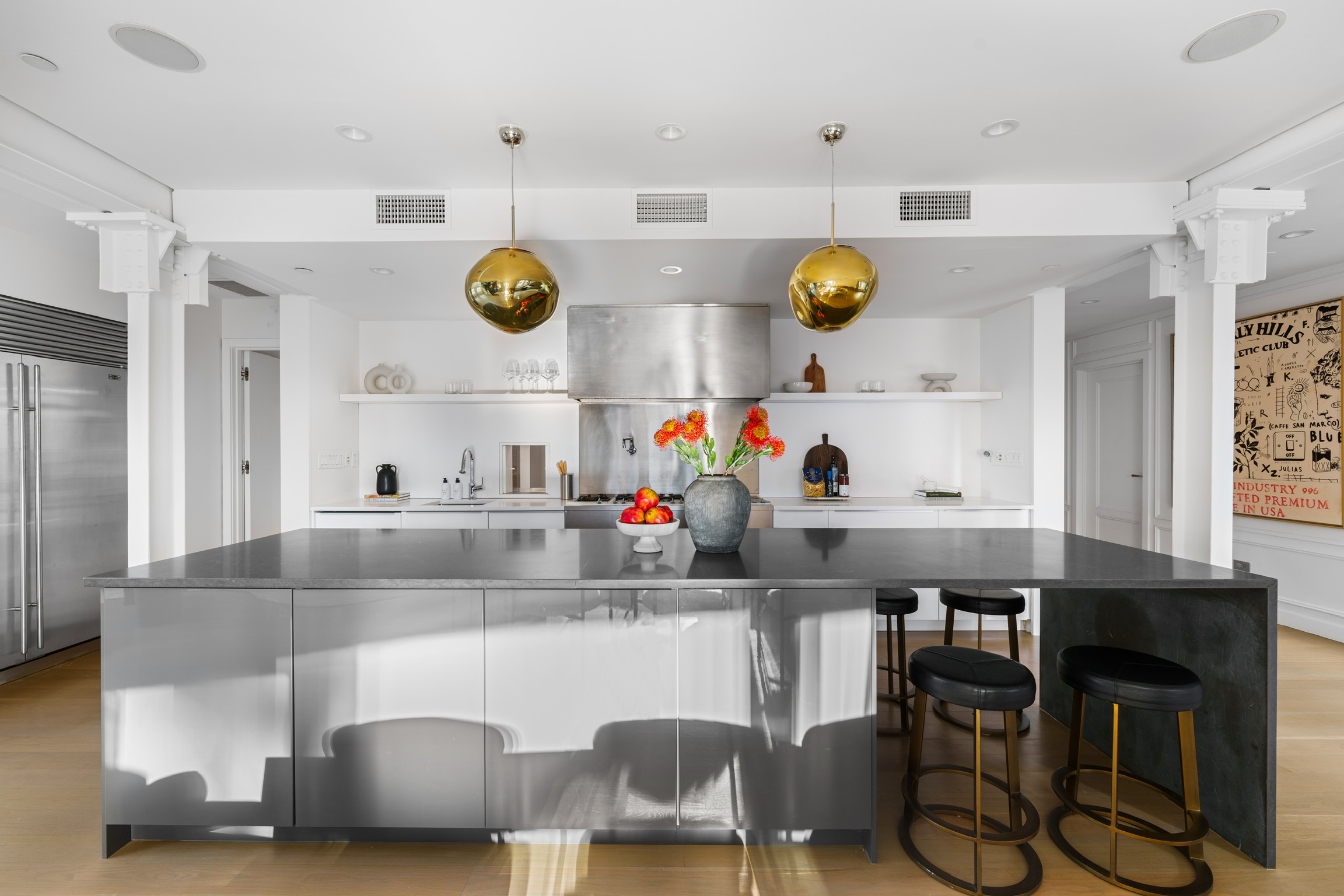 1200 Broadway, Unit PH89 Manhattan, NY 10001 - Photo 7 of 47 a kitchen with a refrigerator and a table