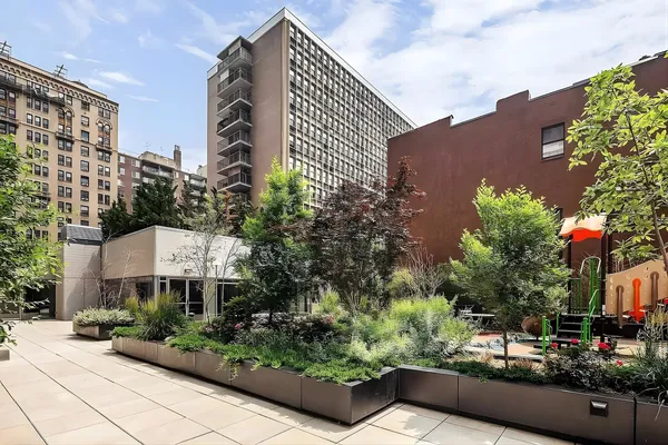 a city street lined with tall buildings