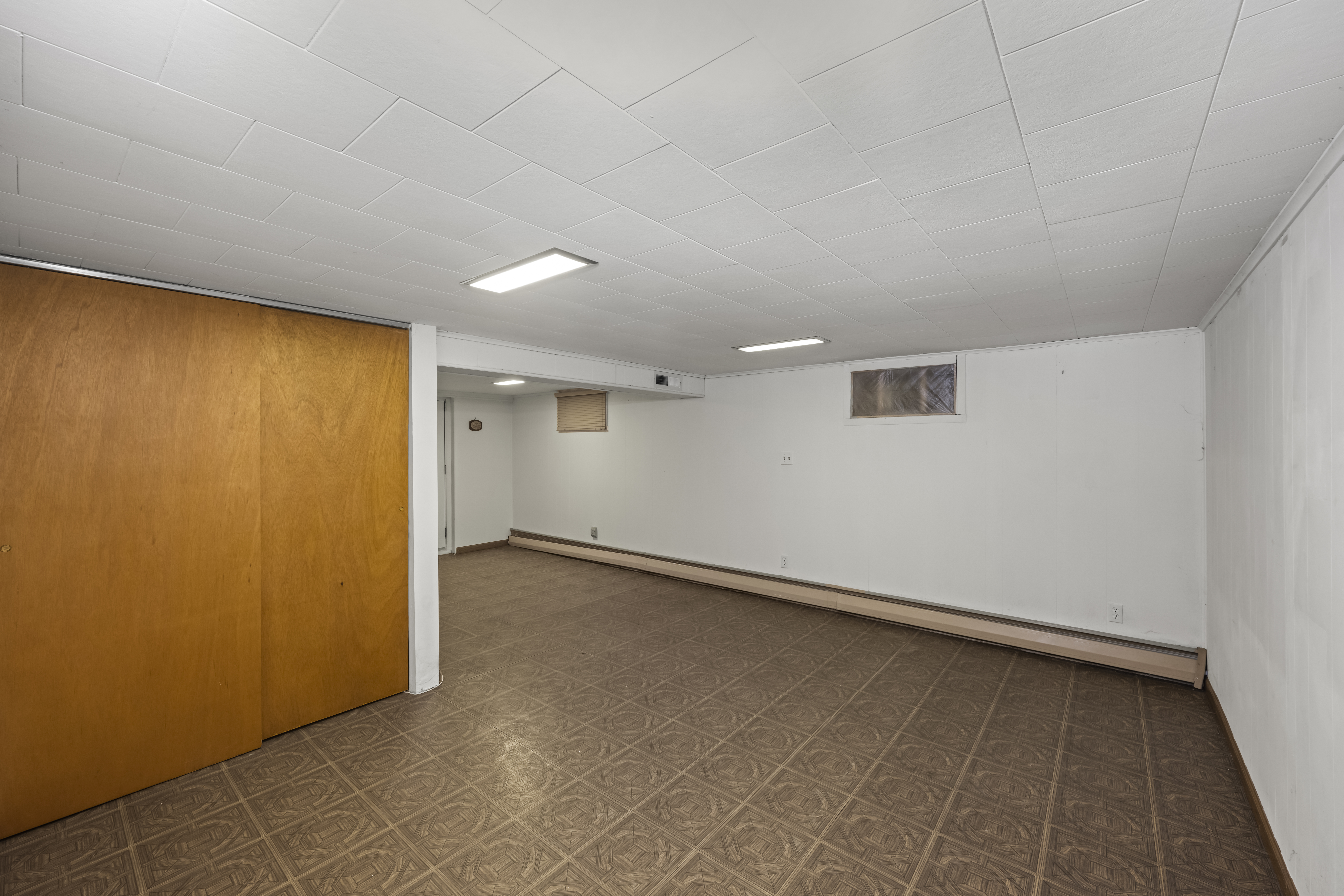 522 Stewart Avenue Staten Island, NY 10314 - Photo 23 of 33 an empty room with a empty space and window