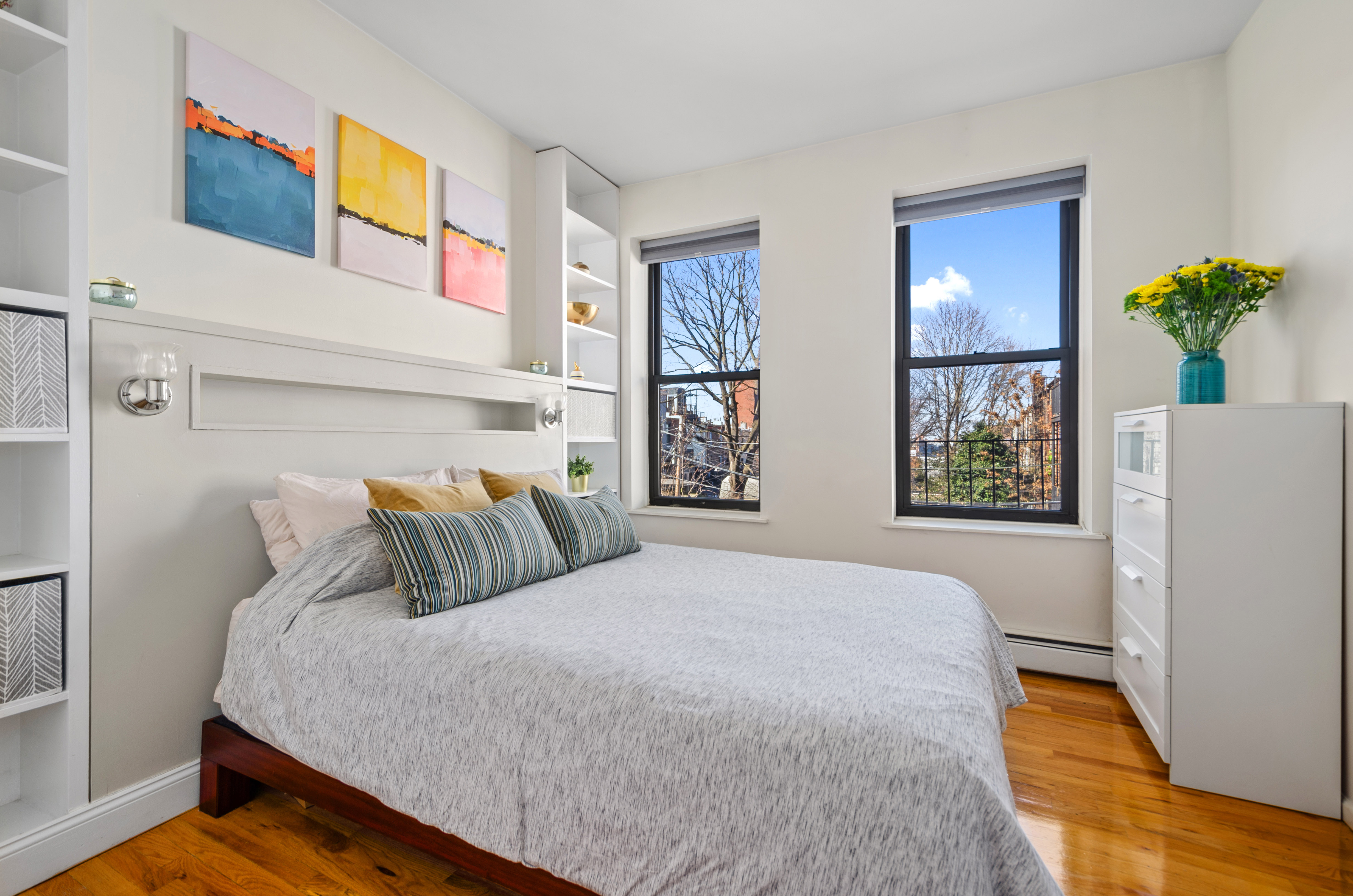 412 7th Avenue, Unit 2R Brooklyn, NY 11215 - Photo 5 of 9 a bedroom with a large bed and a window