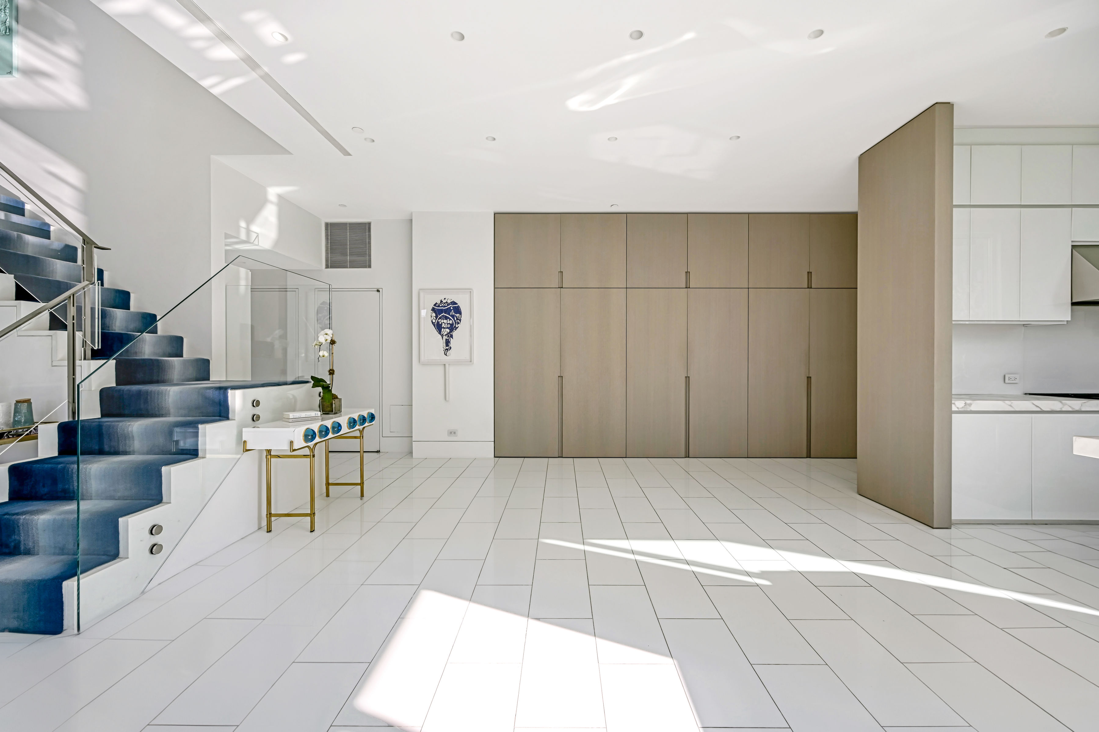 53 Leonard Street, Unit PH Manhattan, NY 10013 - Photo 7 of 24 a view of kitchen with furniture and refrigerator