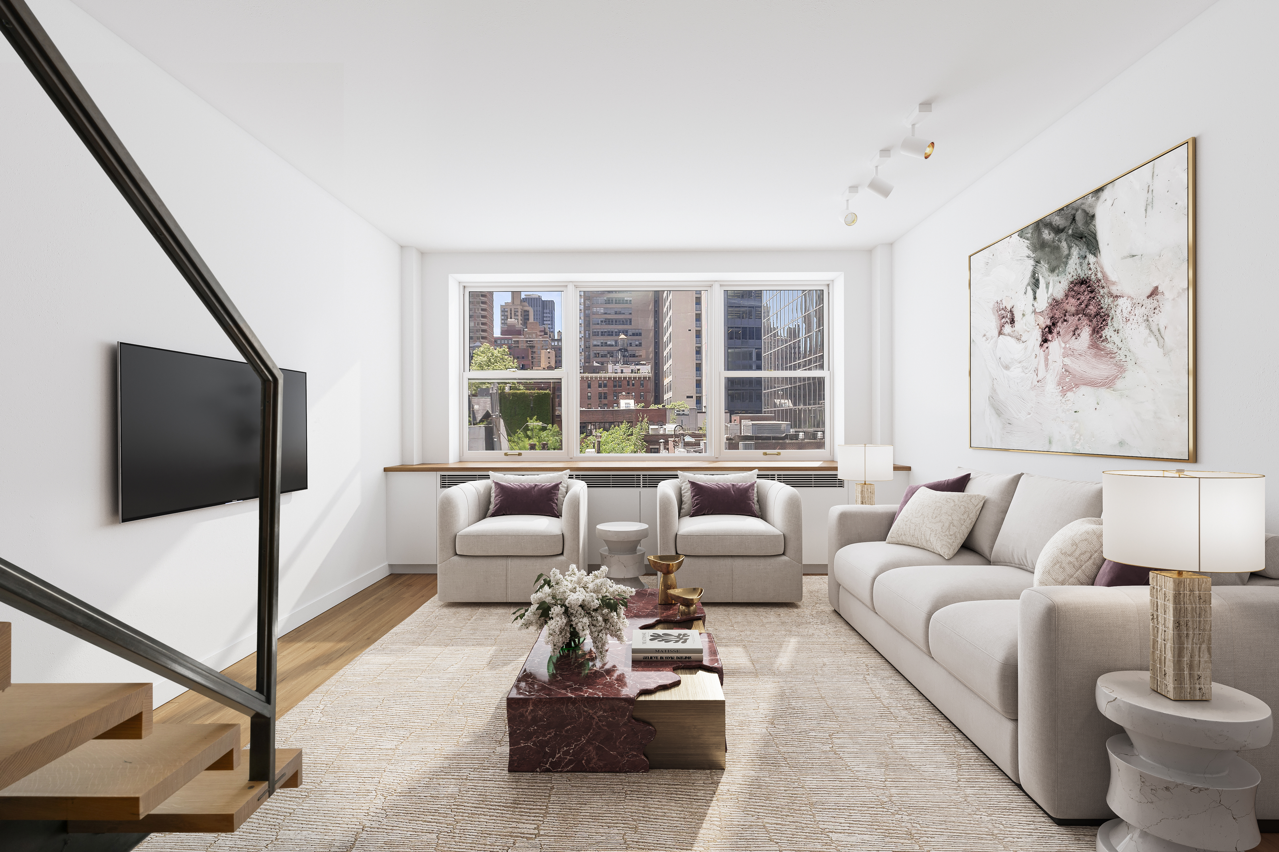 a living room with furniture and a flat screen tv