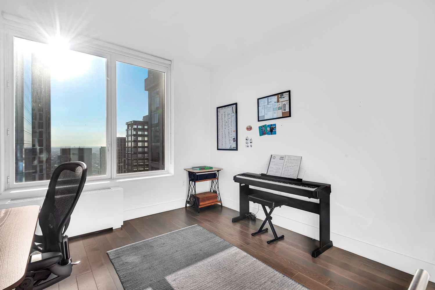 388 Bridge Street, Unit 42G Brooklyn, NY 11201 - Photo 10 of 26 a view of a workspace with furniture and a window