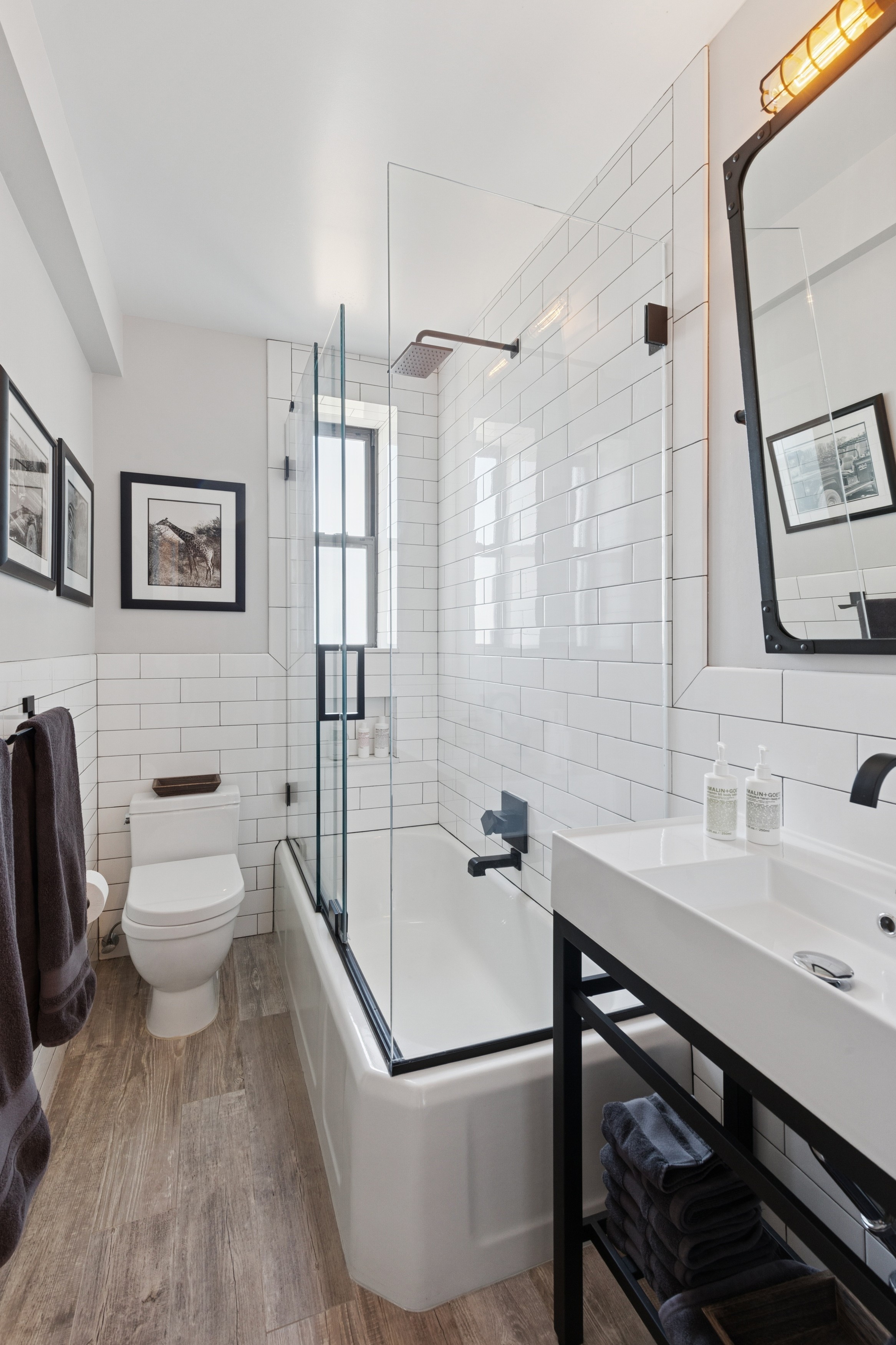 159-34 Riverside Drive West, Unit 5A Manhattan, NY 10032 - Photo 12 of 29 a bathroom with a sink toilet and shower