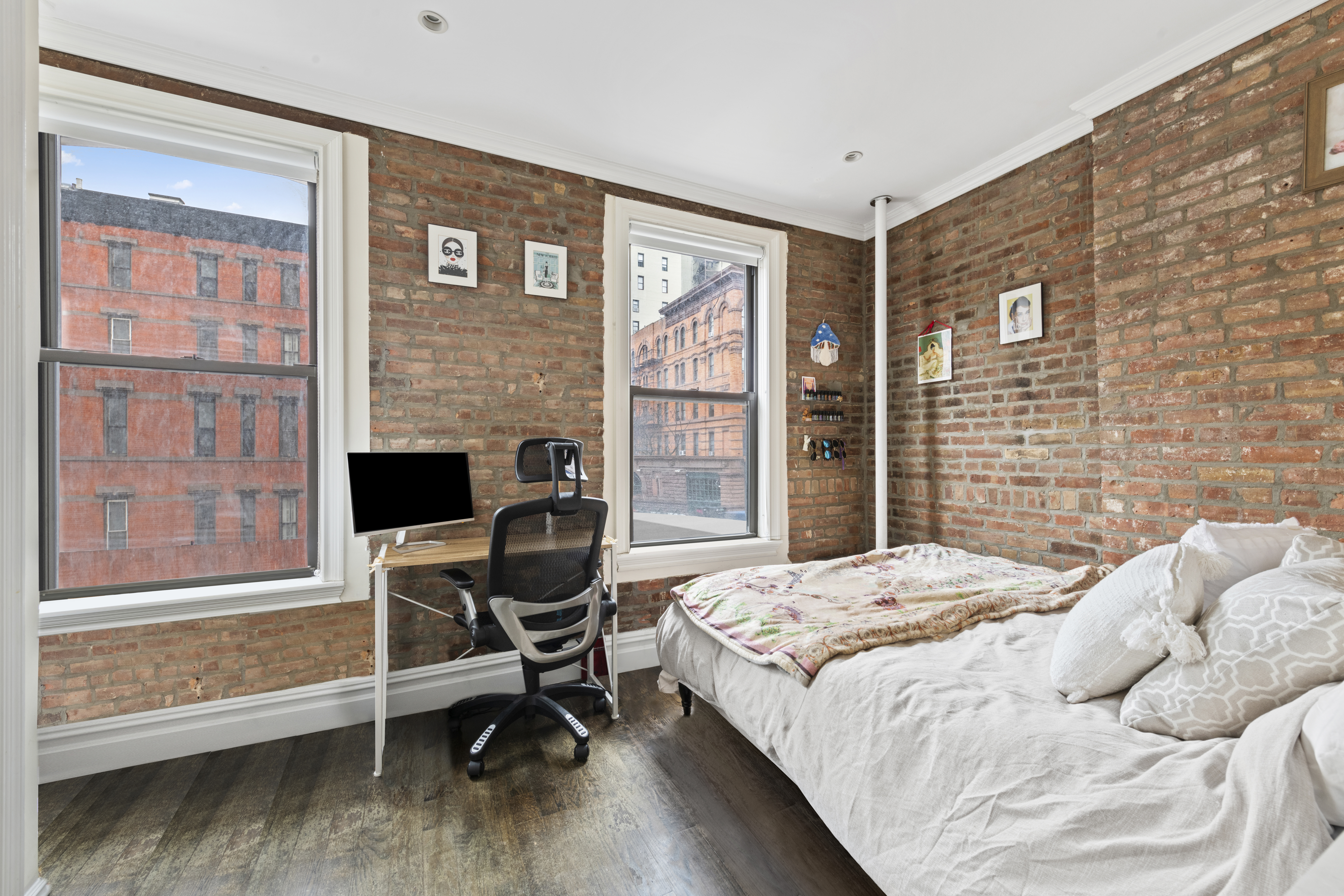 170 West 83rd Street, Unit 2W Manhattan, NY 10024 - Photo 4 of 10 a bedroom with a bed and wooden floor