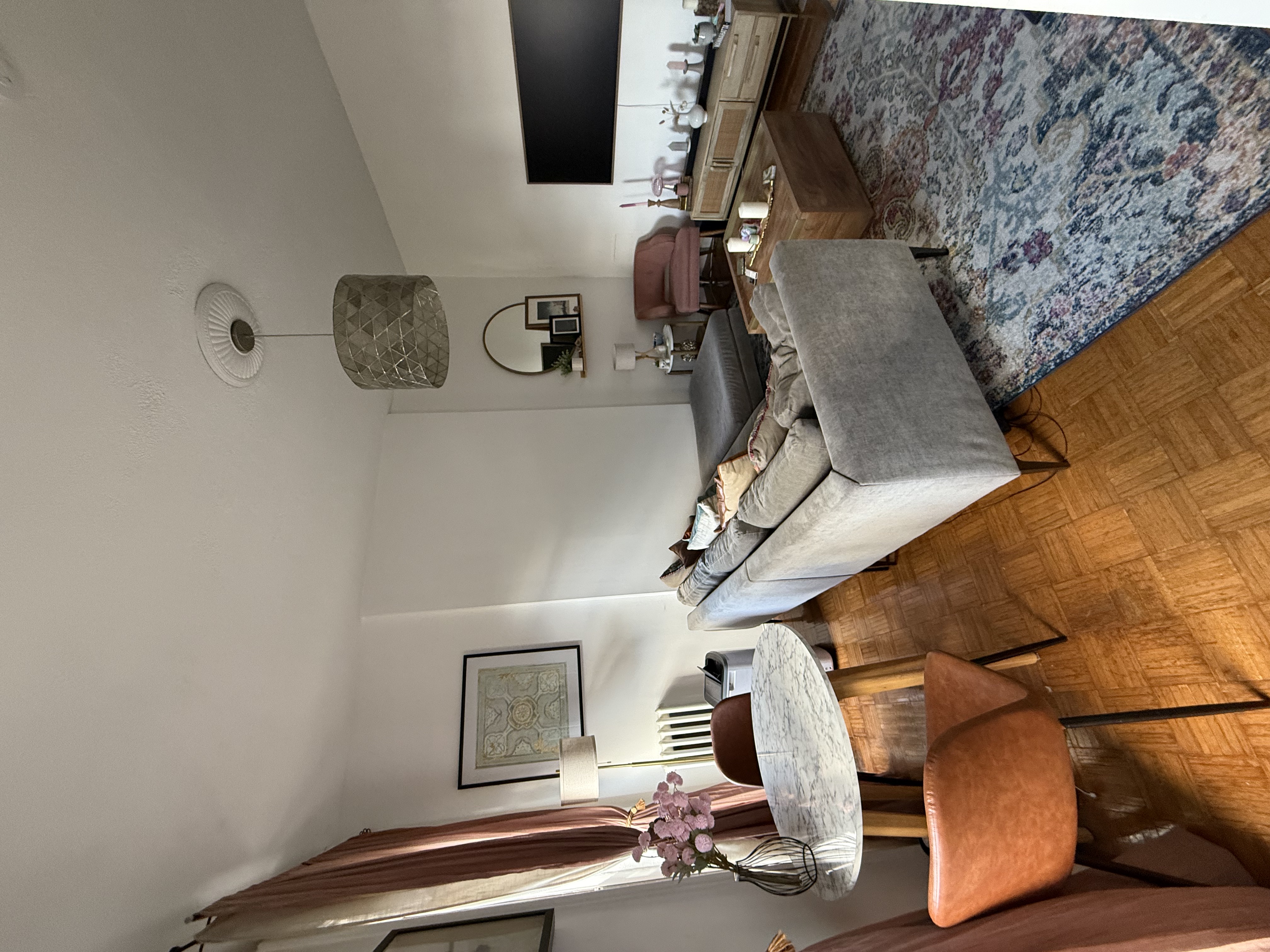 230 17th Street, Unit 2 Brooklyn, NY 11215 - Photo 2 of 16 a living room with furniture and a flat screen tv