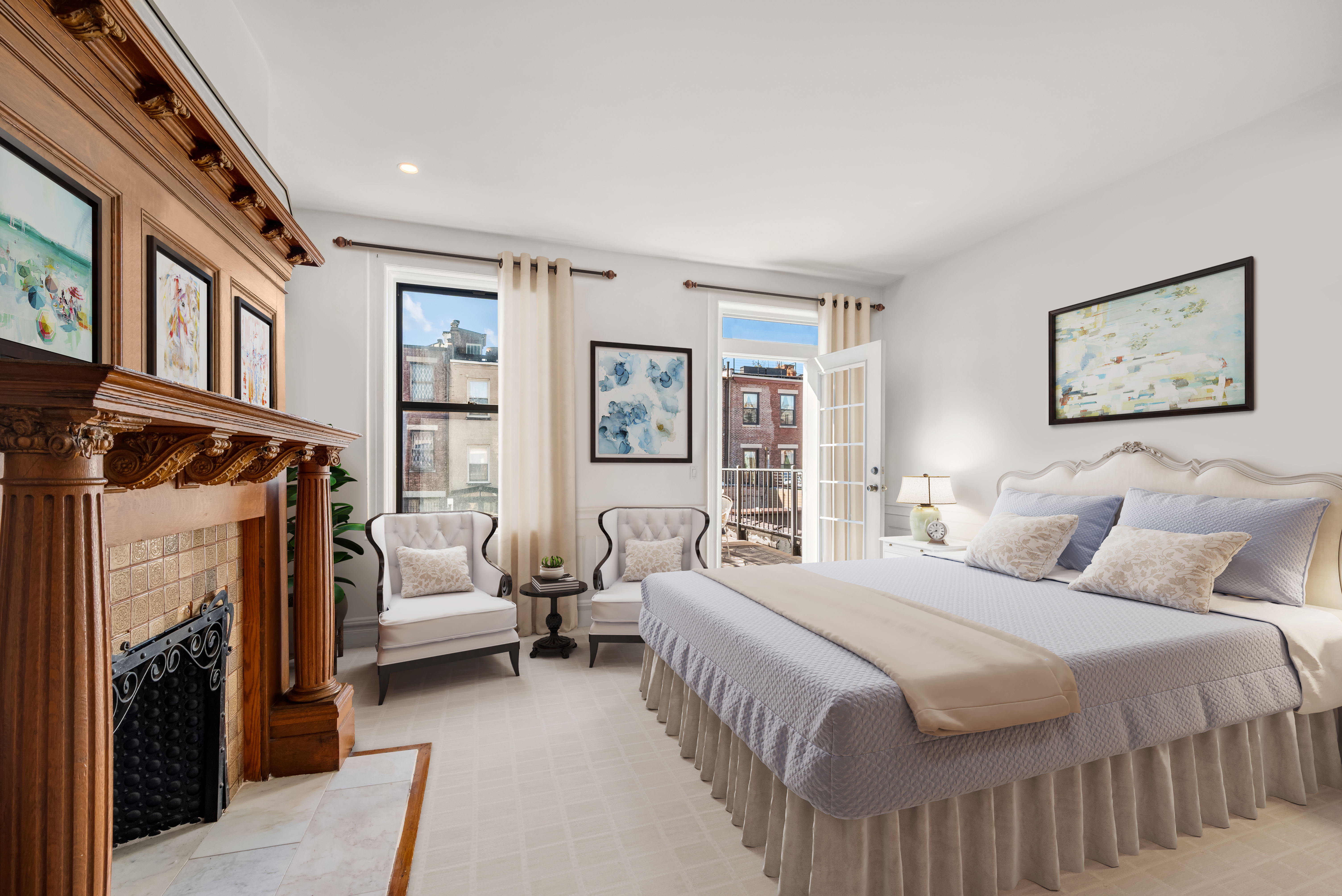 226 West 139th Street Boston, NY 10030 - Photo 9 of 14 a bedroom with a bed and a couch