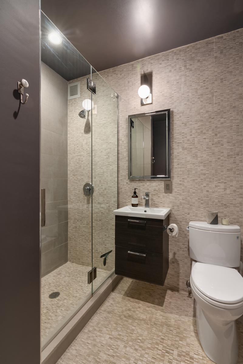 320 West 115th Street, Unit 4 Manhattan, NY 10026 - Photo 11 of 12 a bathroom with a sink toilet and shower