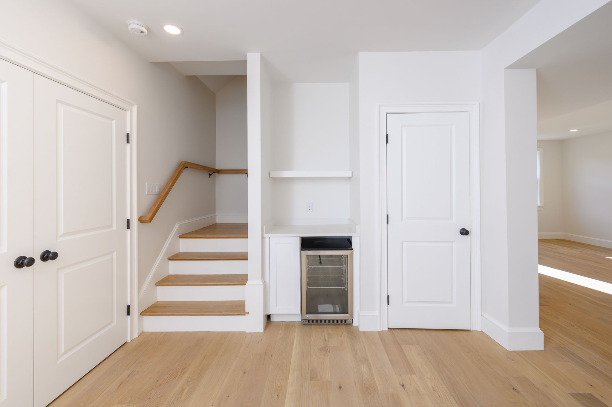 249 Central Avenue Milton, MA 02186 - Photo 49 of 61 a view of a hallway with wooden floor and entryway