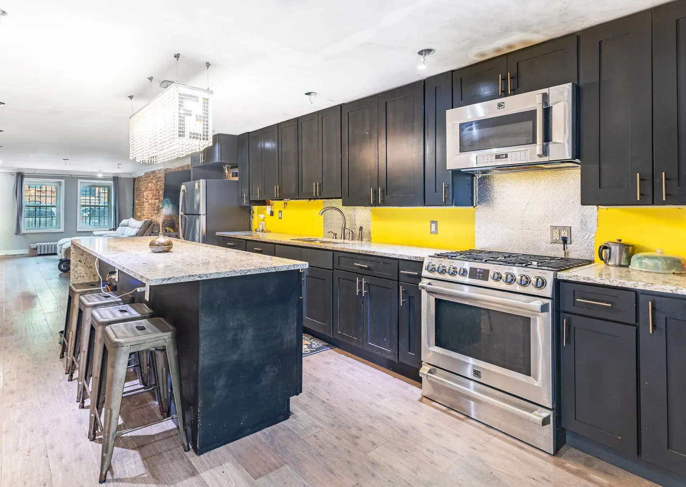 a kitchen with a stove and a sink