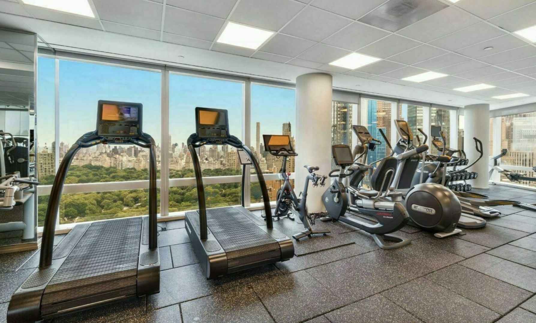 25 Columbus Circle, Unit 59F Manhattan, NY 10019 - Photo 7 of 15 a view of a room with gym equipment