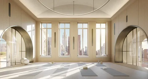 a view of a livingroom with windows