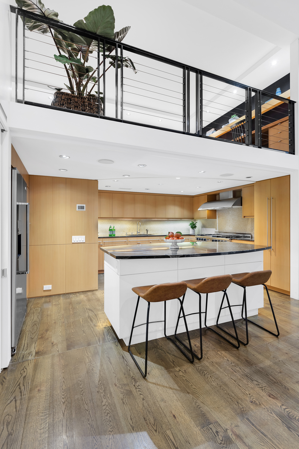 200 Mercer Street, Unit MAIS-G Manhattan, NY 10012 - Photo 5 of 17 a view of entryway dining room and hall with wooden floor