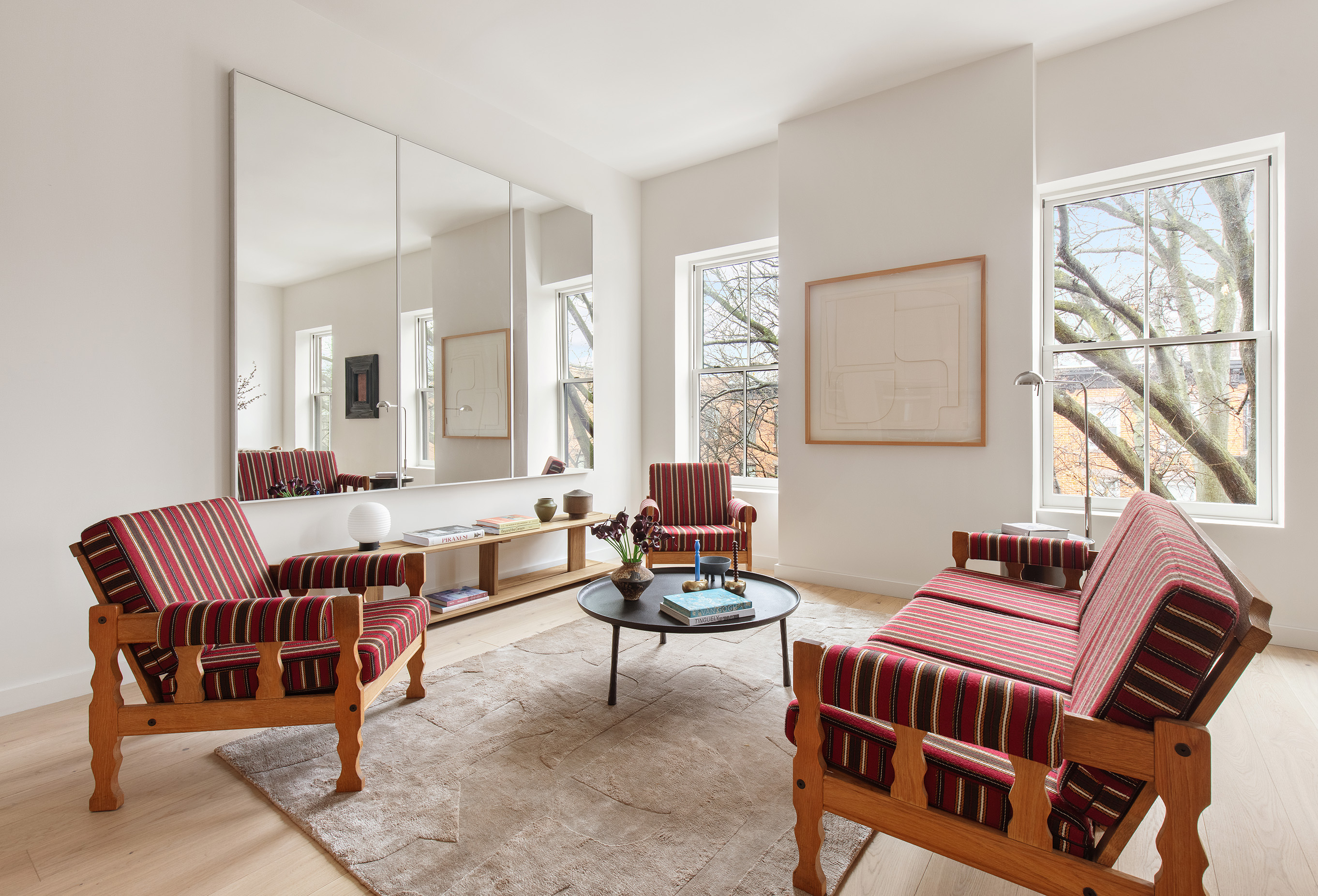238 Degraw Street, Unit 3 Brooklyn, NY 11231 - Photo 1 of 17 a living room with furniture a wooden floor and a large window