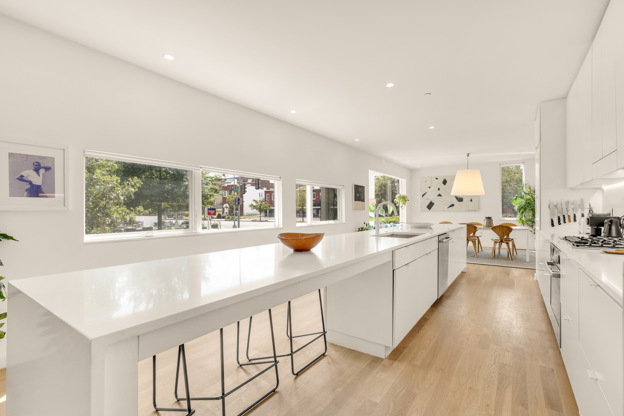 1501 4th Street Northwest, Unit 1 Washington, DC 20001 - Photo 21 of 41 a large white kitchen with a large window