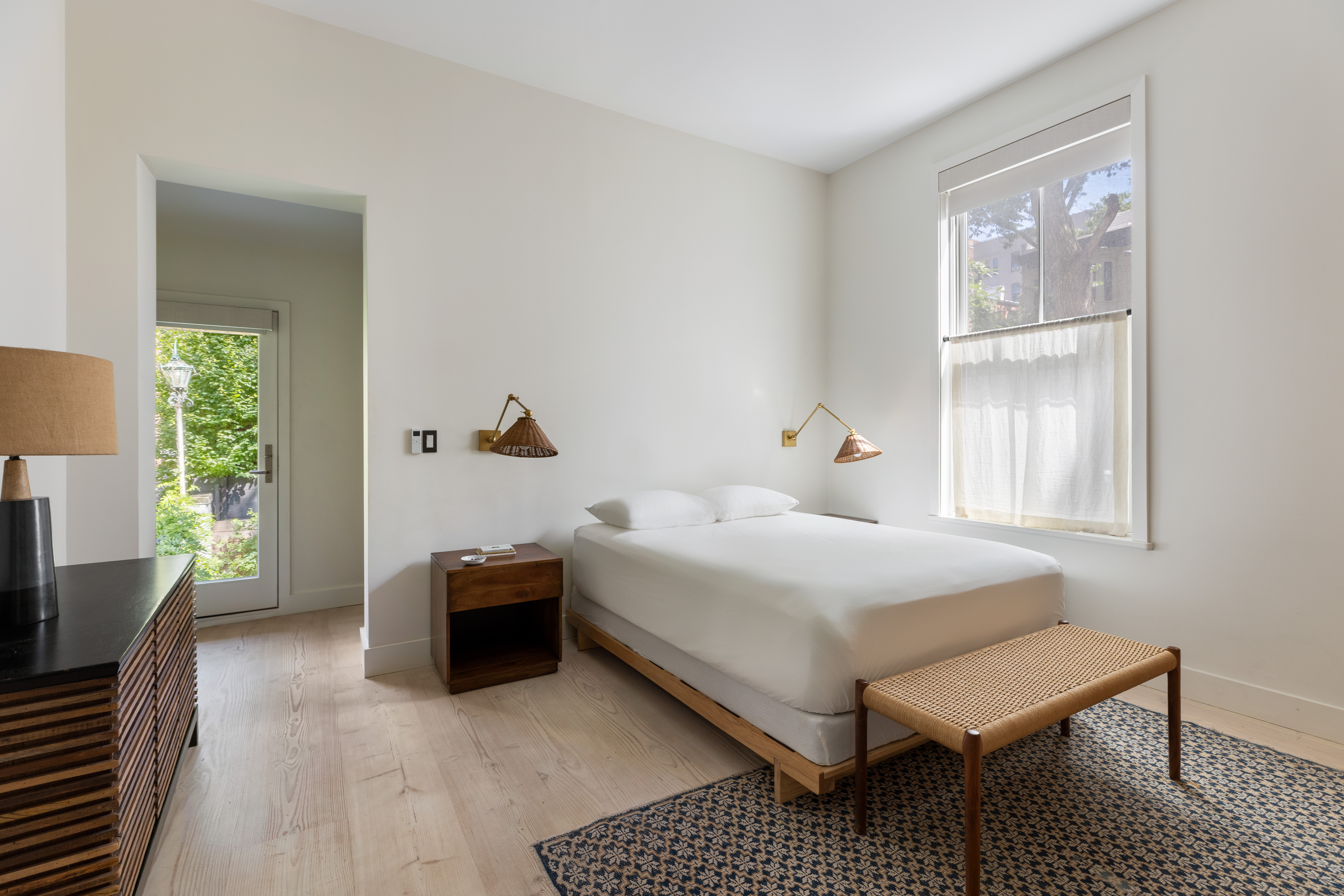 113 Columbia Heights, Unit PARLOR Brooklyn, NY 11201 - Photo 7 of 12 a bedroom with a bed and wooden floor