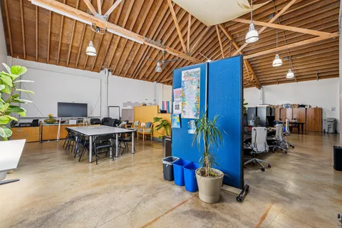a view of a chairs and tables in patio