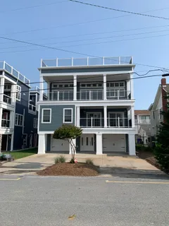 a front view of a building with a street