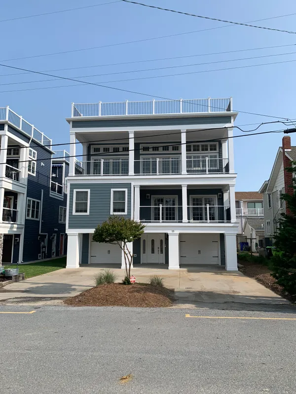 a front view of a building with a street