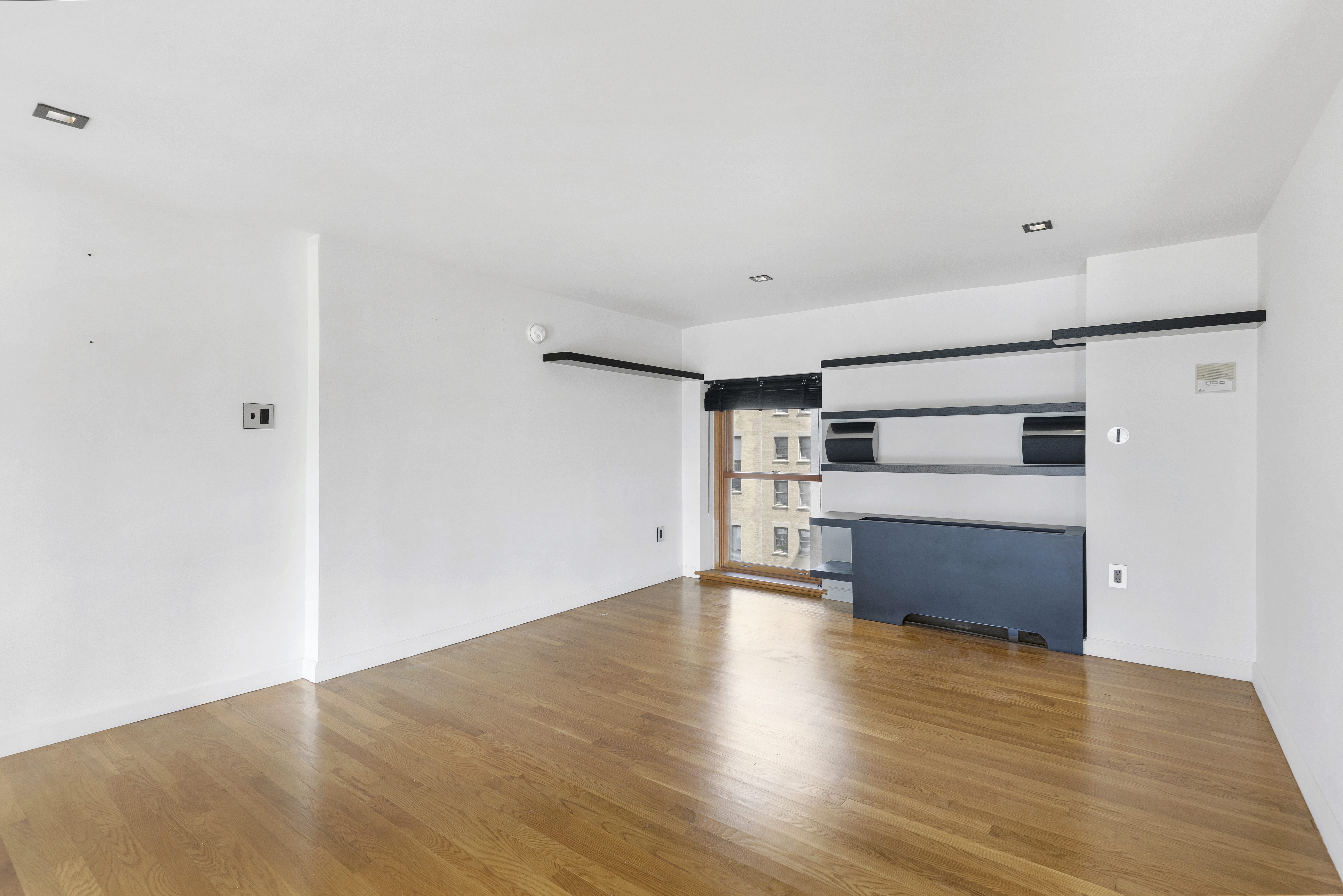 305 2nd Avenue, Unit 537 Manhattan, NY 10003 - Photo 6 of 11 a view of empty room with wooden floor
