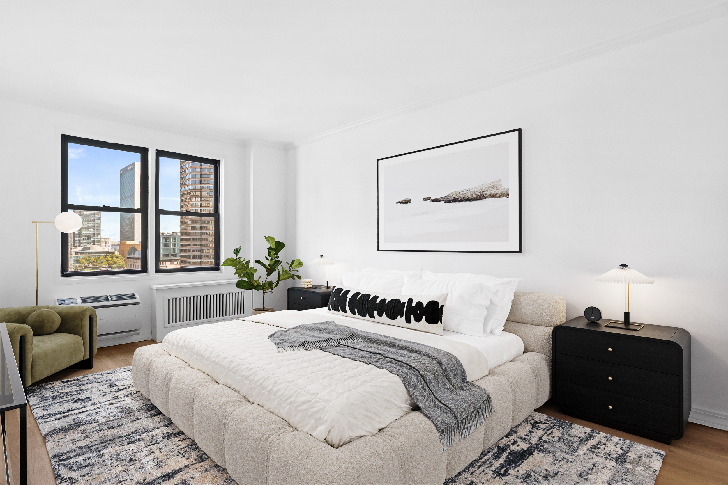 333 East 34th Street, Unit 14D Manhattan, NY 10016 - Photo 4 of 11 a bedroom with a bed and wooden floor