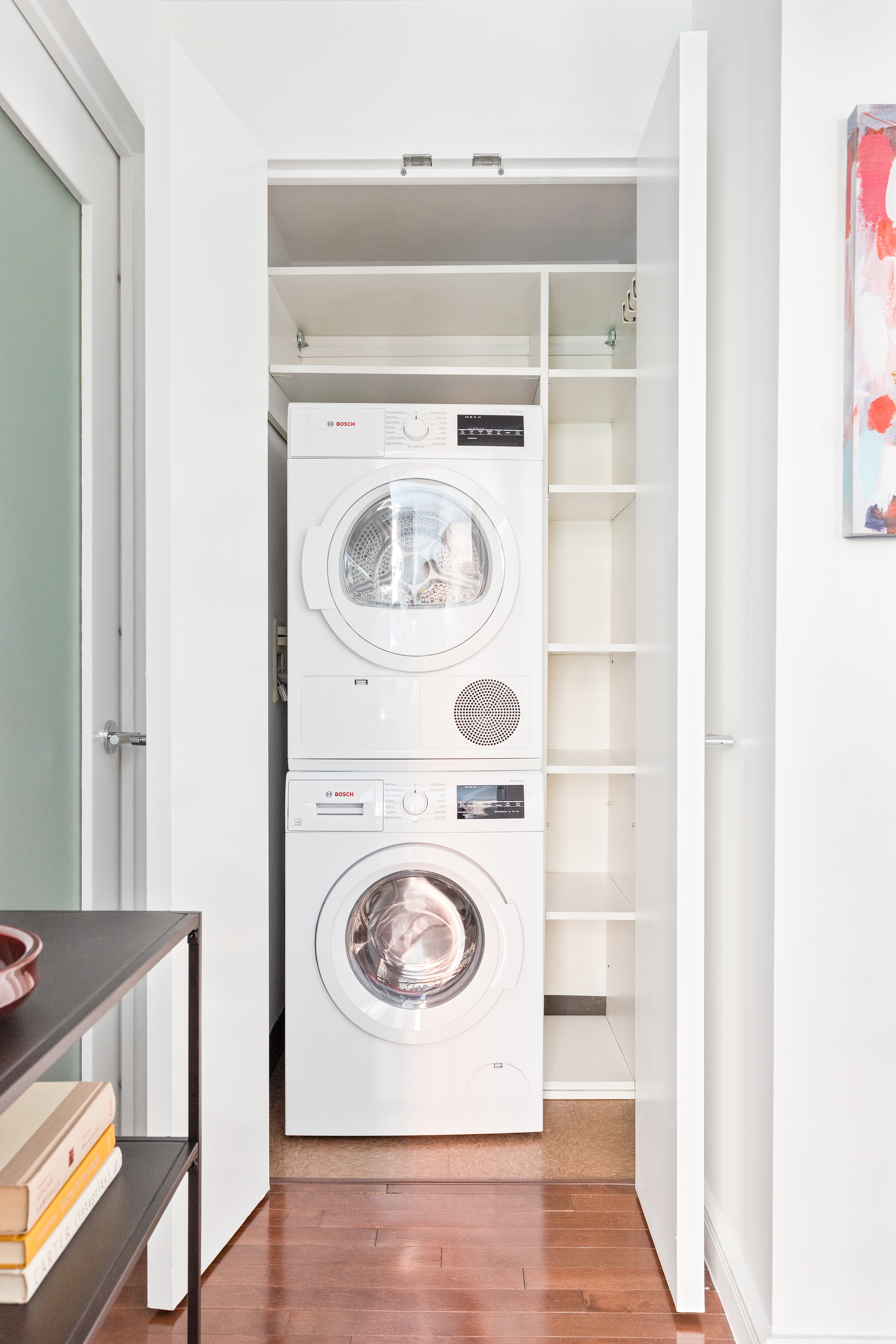 225 East 34th Street, Unit 3H Manhattan, NY 10016 - Photo 7 of 18 a utility room with dryer and washer