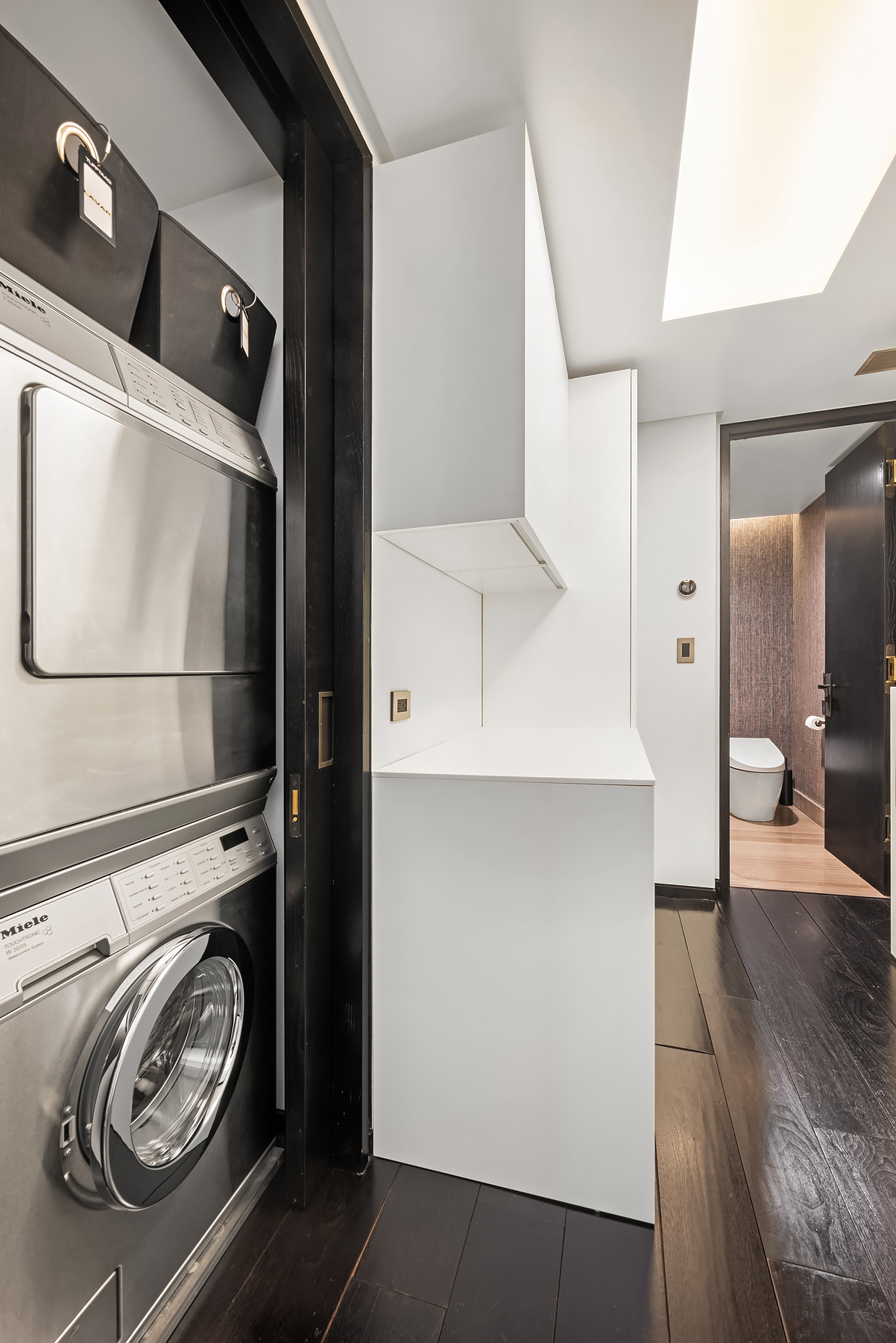 279 Central Park West, Unit 8B Manhattan, NY 10024 - Photo 11 of 15 a view of washer and dryer