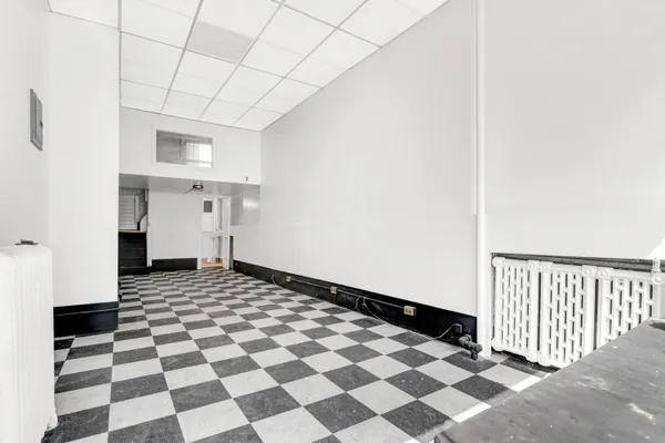 a view of a black and white checkered floor
