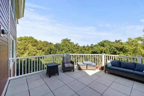 a balcony with a bench