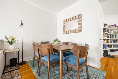 a view of a livingroom with furniture and a table