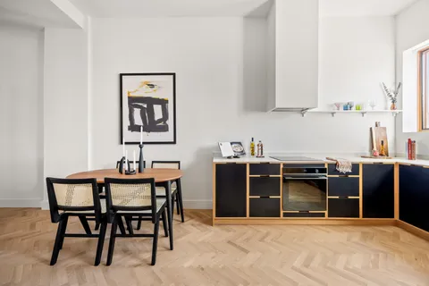 a view of a dining room with furniture