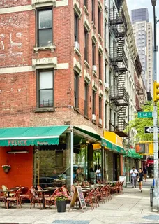 a view of a building with a street
