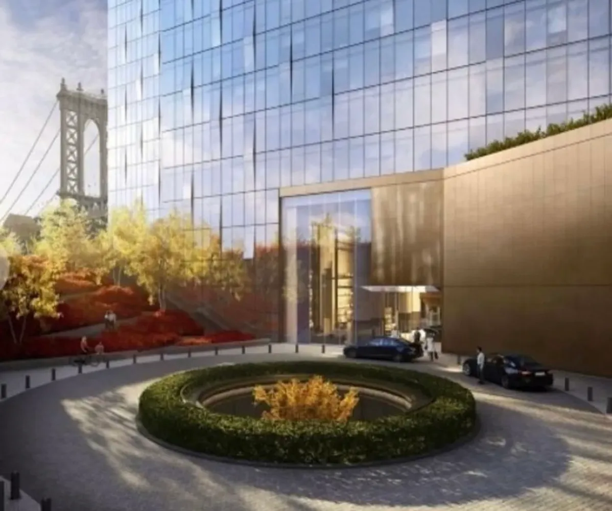 a picture of a bench in front of a wall