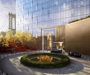 a picture of a bench in front of a wall