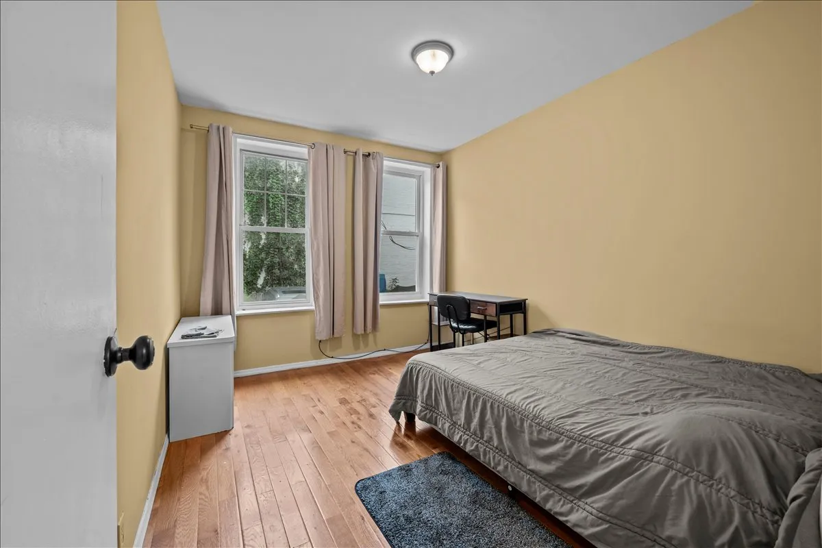 a bathroom with a granite countertop toilet a sink and bathtub