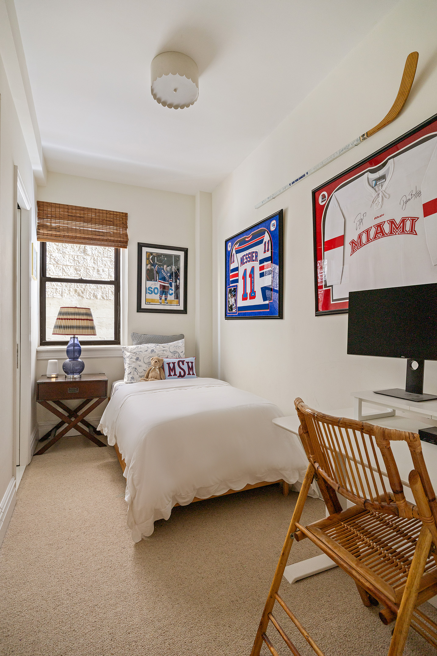 129 East 82nd Street, Unit 1C Manhattan, NY 10028 - Photo 10 of 13 a bedroom with a bed and a couch