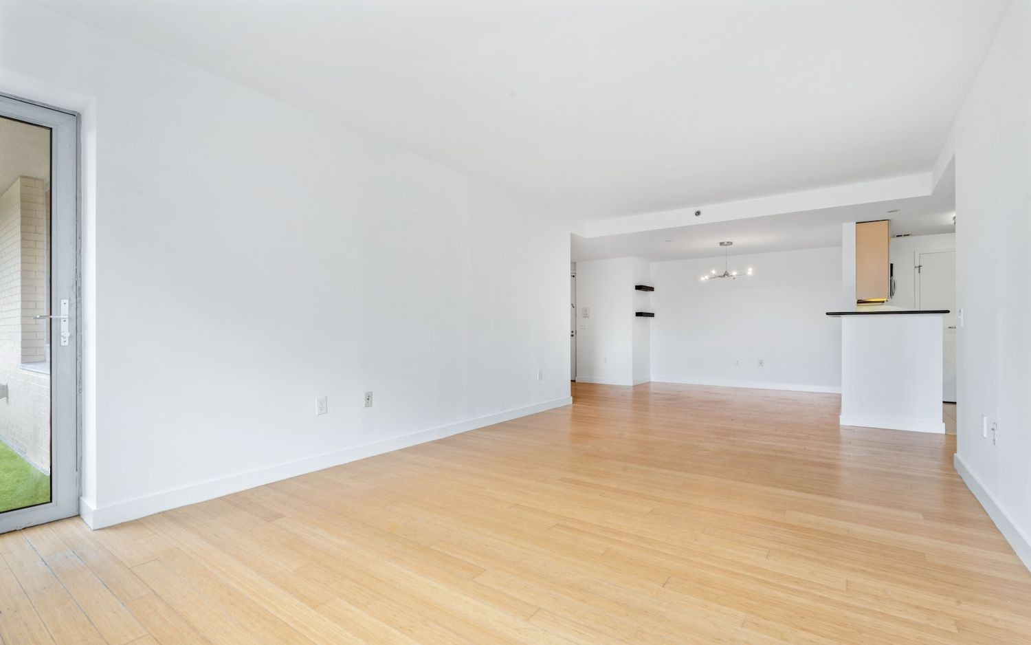 40 West 116th Street, Unit B503 Manhattan, NY 10026 - Photo 2 of 36 a view of empty room with wooden floor