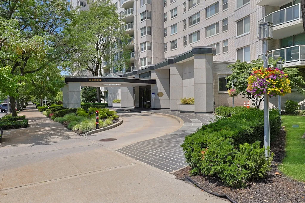 a view of a city with tall buildings