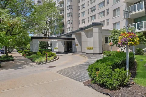 a view of a city with tall buildings