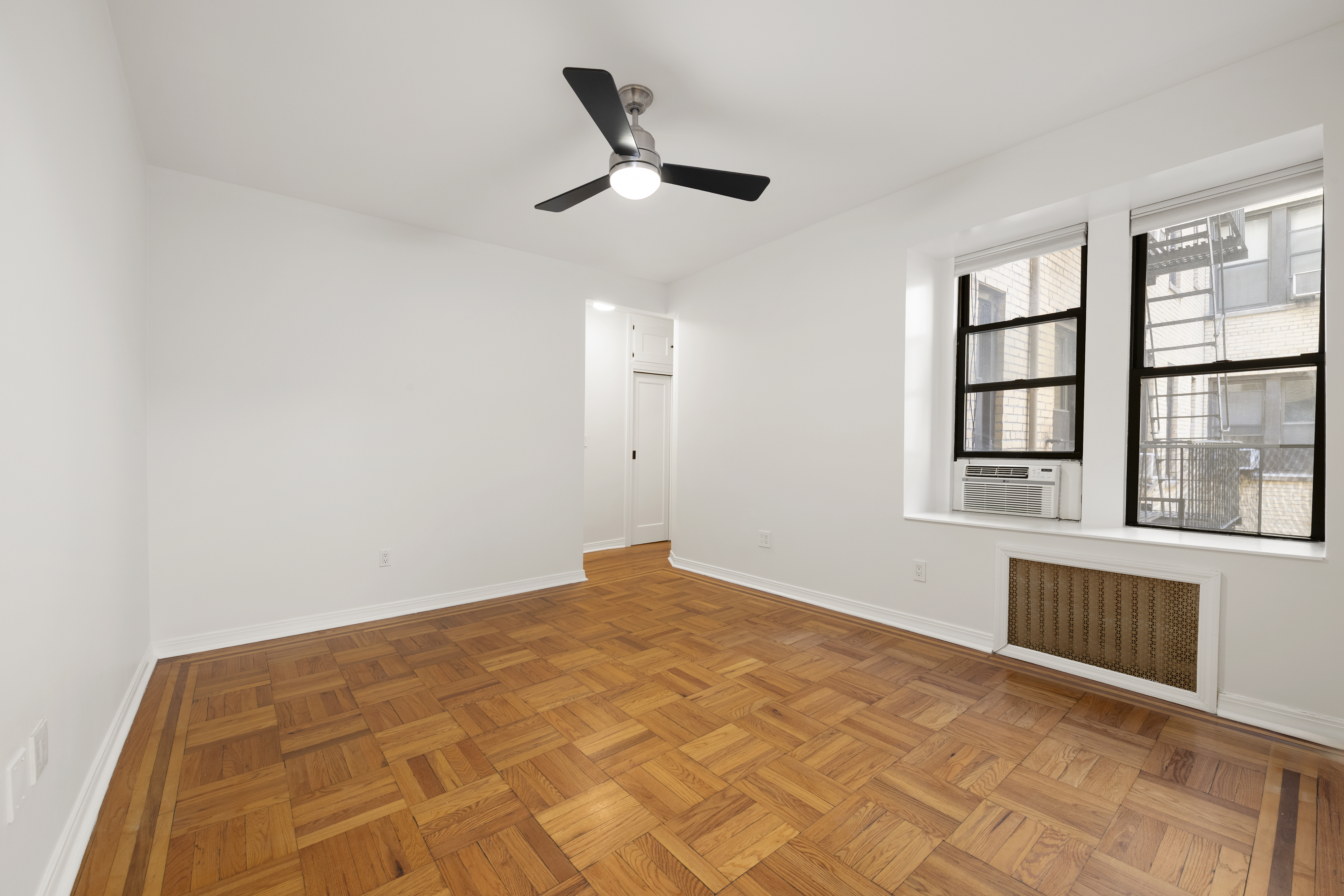 67 Morton Street, Unit 2A Manhattan, NY 10014 - Photo 2 of 10 a view of an empty room with a window