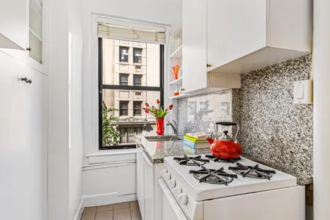 a storage room with washer and dryer