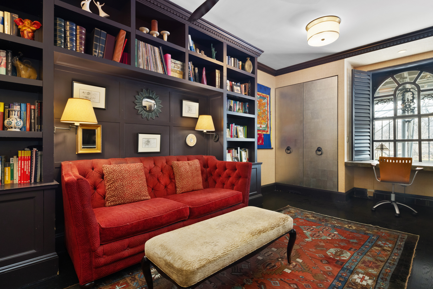 333 Central Park West, Unit 11 Manhattan, NY 10025 - Photo 6 of 21 a living room with furniture and a book shelf