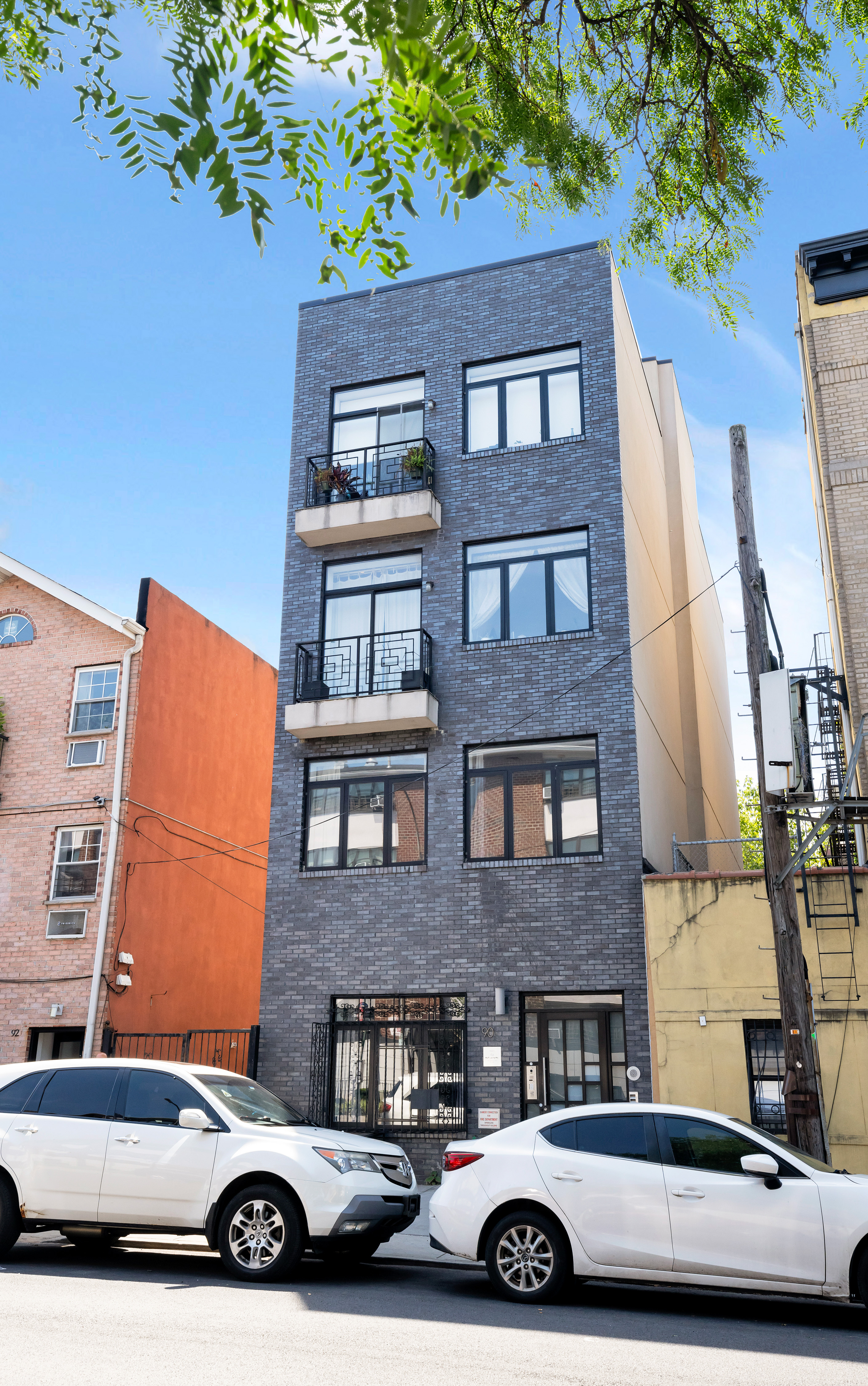 90 Troy Avenue, Unit 2 Brooklyn, NY 11213 - Photo 11 of 12 a car parked in front of a building