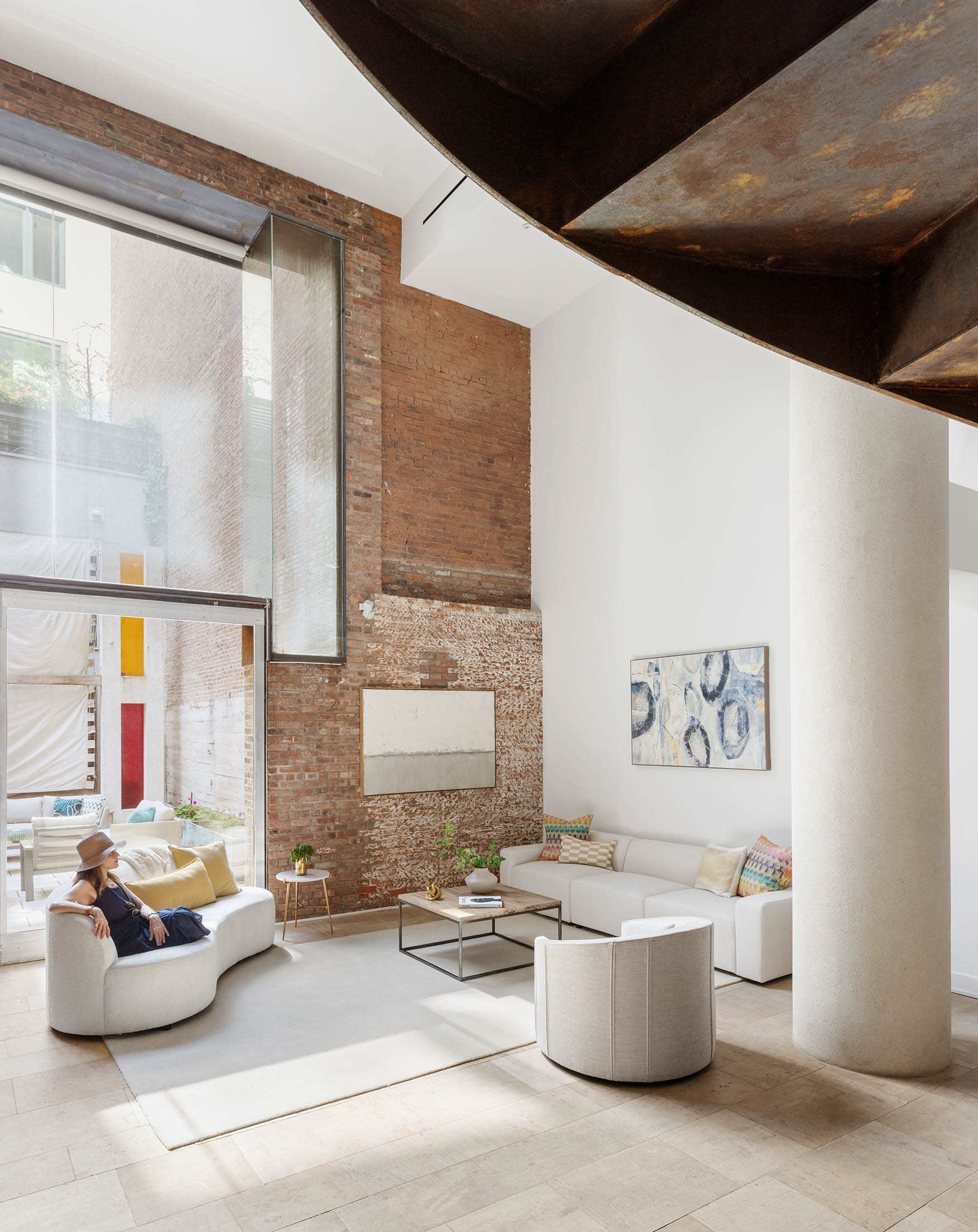 16 Jay Street, Unit 1 Manhattan, NY 10013 - Photo 2 of 16 a living room with furniture and window