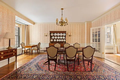 a view of a livingroom with furniture and window