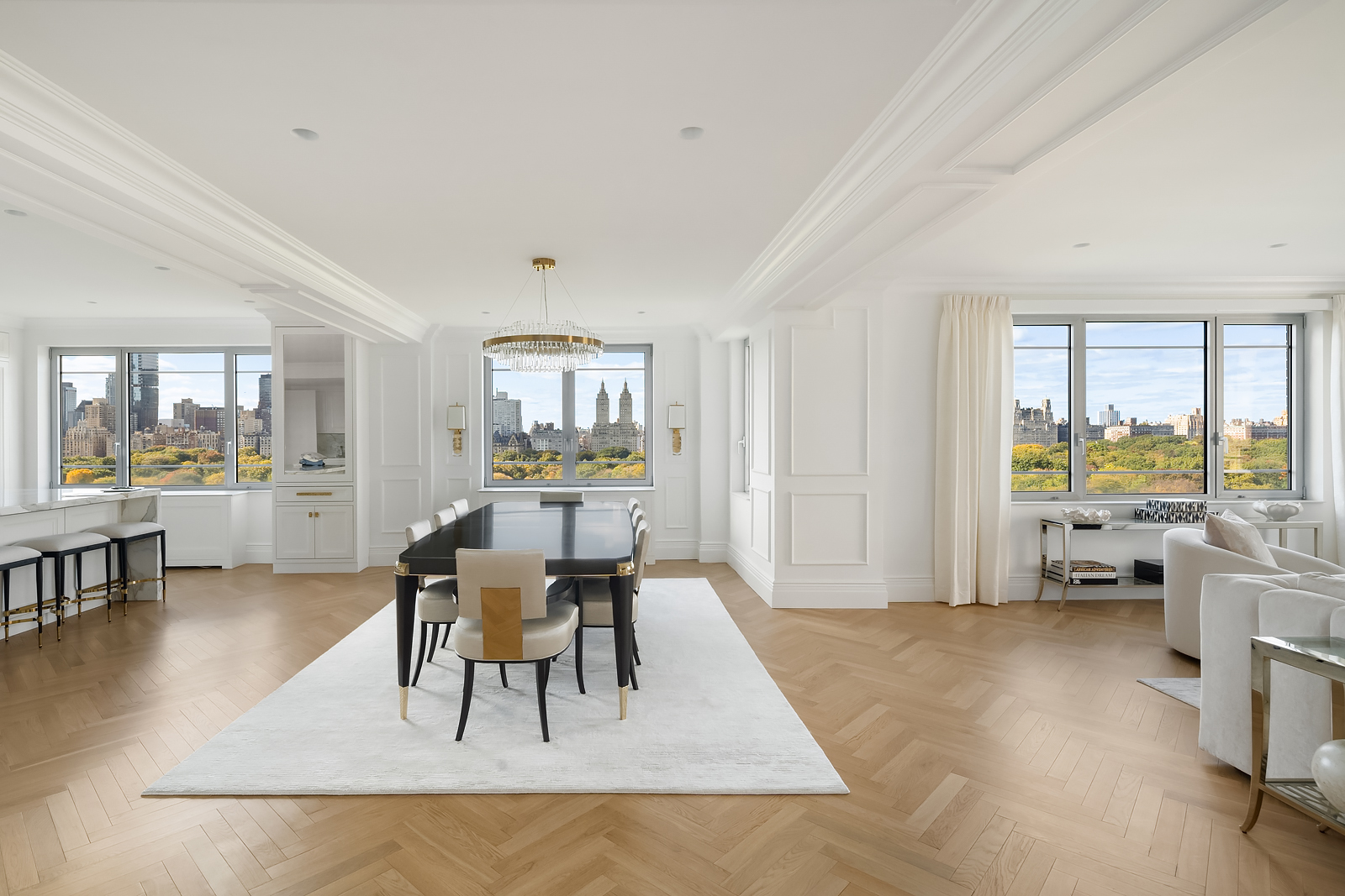 930 5th Avenue, Unit 18A Manhattan, NY 10021 - Photo 7 of 16 a living room with furniture and a table