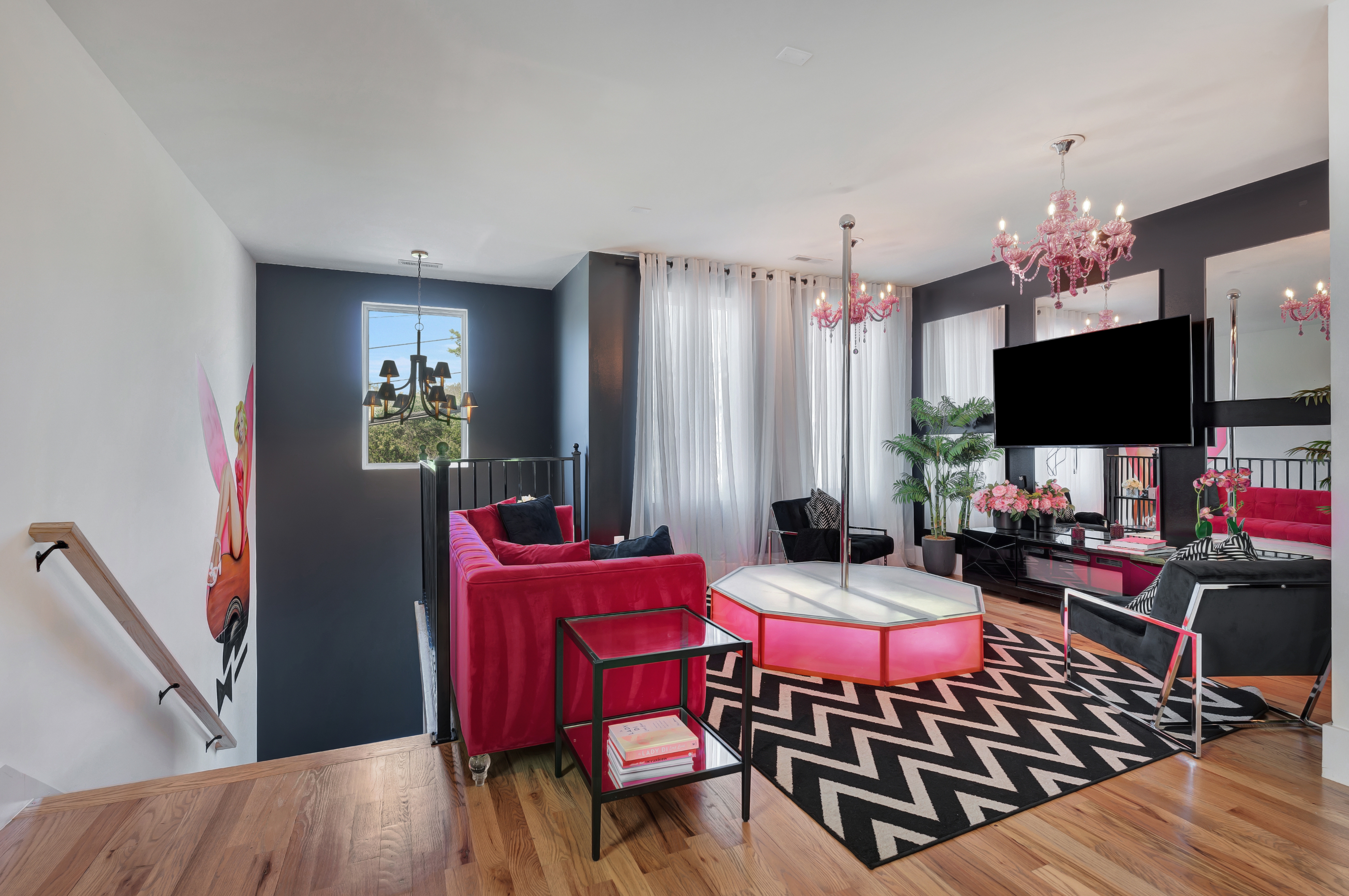 1203 Brick Church Pike Nashville, TN 37207 - Photo 2 of 44 a living room with furniture a flat screen tv and a window